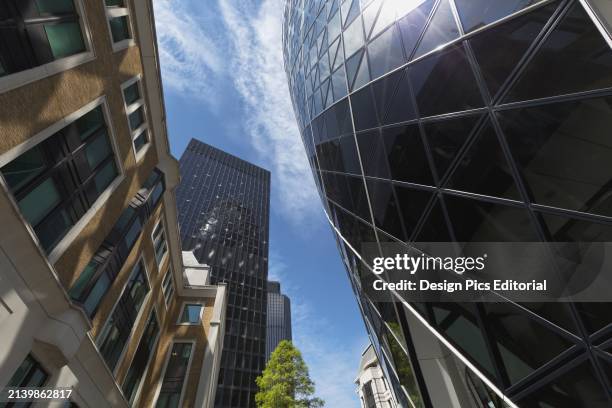 United Kingdom, England, Low angle view of building exteriors; London.