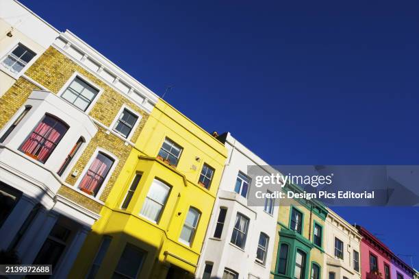 Colourful Facades of Residential Buildings In A Row, Notting Hill. London, England.