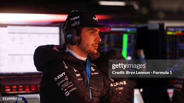 Esteban Ocon of France and Alpine F1 looks on in the garage during practice ahead of the F1 Grand Prix of Japan at Suzuka International Racing Course...