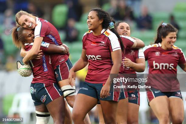Reds celebrate winning during the round four Super Rugby Women's match between Melbourne Rebels and Queensland Reds at AAMI Park on April 05, 2024 in...