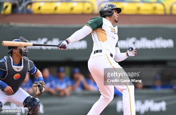 Steven Moya of TSG Hawks hits a 2 run homer in the bottom of the first inning during the CPBL game between Fubon Guardians and TSG Hawks at...