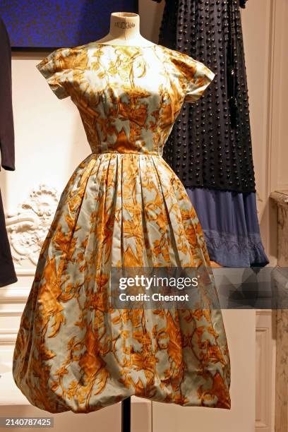 Creation by designer Cristobal Balenciaga, Haute Couture collection, Fall-Winter 1957, silk dress in printed silk satin, sky blue and gold is...