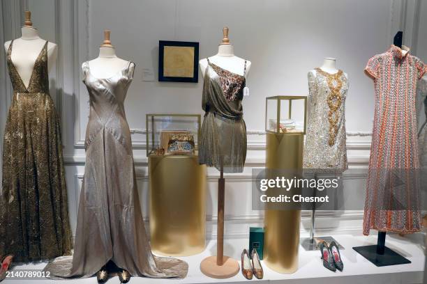 Creations by designers Pierpaolo PIccioli and Marie-Grazia, Madeleine Vionnet, Gianni Versace, Pierre Cardin and Michel Goma are displayed during "Un...