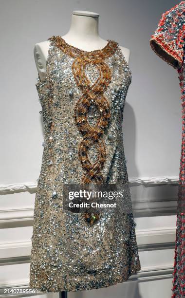 Creation by designer Pierre Cardin, haute couture collection, circa 1966, short trapeze evening dress is displayed during "Un siècle de Haute...