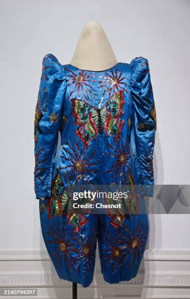 Creation by anonymous designer circa 1920/1930, exceptional costume or clown bag in blue satin, fully embroidered is displayed during "Un siècle de...