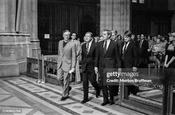 President Jimmy Carter arrives at an inter-faith prayer service for the Americans held hostage in Iran on November 15, 1979. With Carter are...