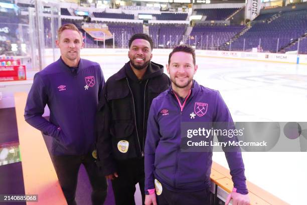 Premier League players Matt Jarvis, Jack Collison and Daniel Sturrridge look on inside Bridgestone Arena before the Nashville Predators game on April...