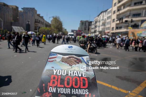 Iranian attend the funeral procession for seven Islamic Revolutionary Guard Corps members killed in a strike in Syria, which Iran blamed on Israel,...