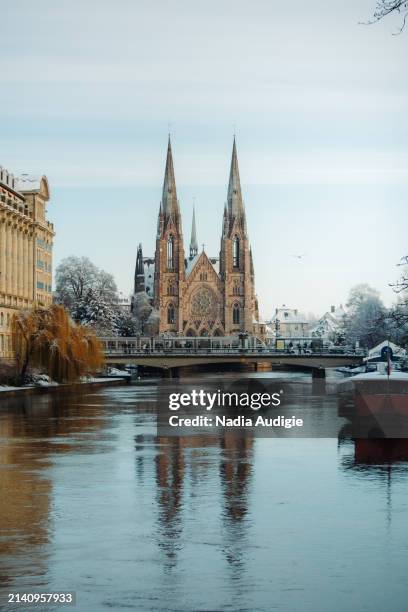 saint paul church winter snowy day in strasbourg - christian audigie stock pictures, royalty-free photos & images