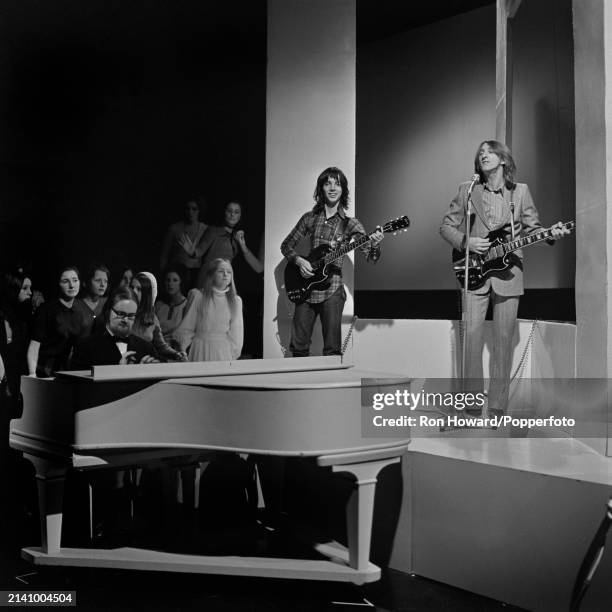 English rock group Thunderclap Newman perform in front of a studio audience on the set of a pop music television show in London circa 1970. Members...