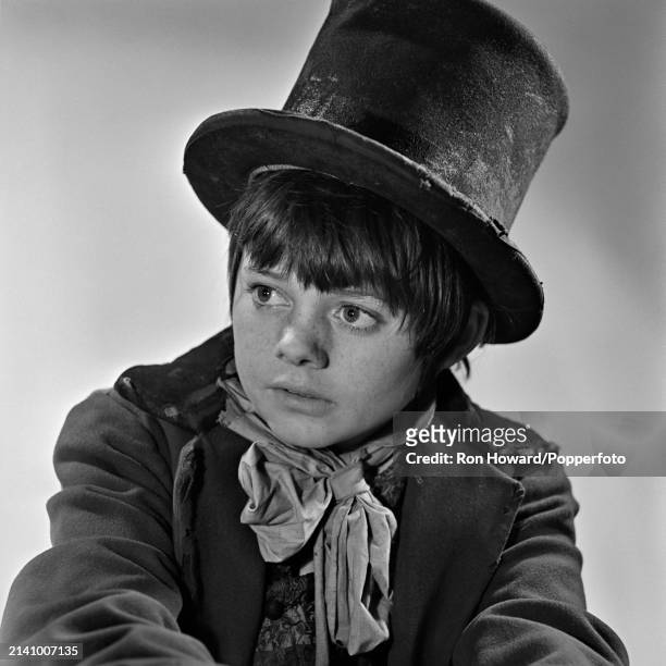 English actor and singer Jack Wild dressed in character as the Artful Dodger as played in the film version of Lionel Bart's stage musical Oliver!, in...