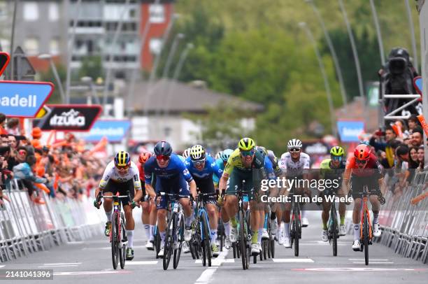 Orluis Aular of Venezuela and Team Caja Rural - Seguros RGA, Alex Aranburu of Spain and Movistar Team, stage winner Romain Gregoire of France and...