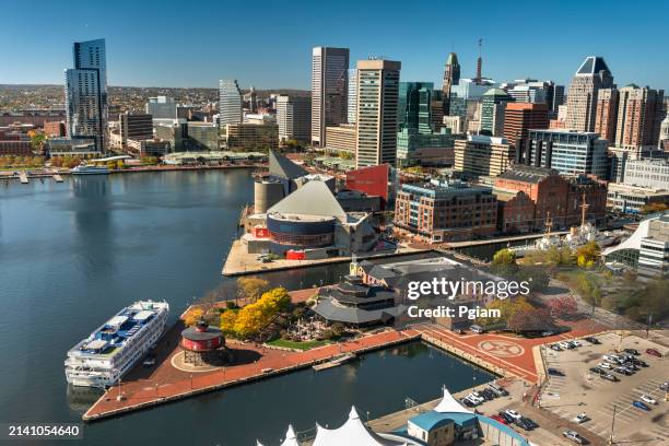 baltimore maryland downtown city skyline and inner harbour by the patapsco river - federal hill stock pictures, royalty-free photos & images