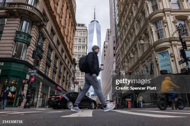 People walk through lower Manhattan moments after New York City and parts of New Jersey experienced a 4.8 magnitude earthquake on April 05, 2024 in...
