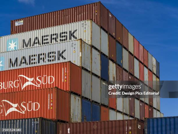 Shipping containers piled in a shipyard, Tauranga Container Terminal, Bay of Plenty; Mount Maunganui, Bay of Plenty Region, New Zealand