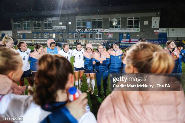 General view as Emma Coates, Head Coach of England, speaks with players of England as they huddle after the UEFA Women's U23 International match...