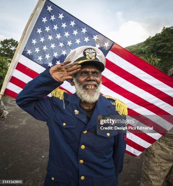Leader of The Jon Frum Cargo Cult Saluting The American Flag. Tanna Island, Vanuatu.