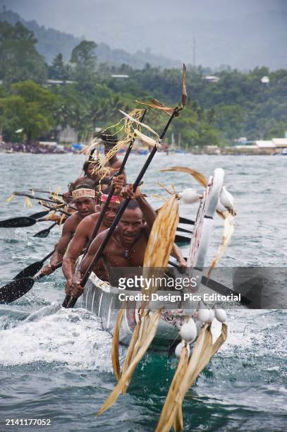 Participants In Canoe Race at Milne Bay Canoe Festival. Alotau, Milne Bay, Papua New Guinea.