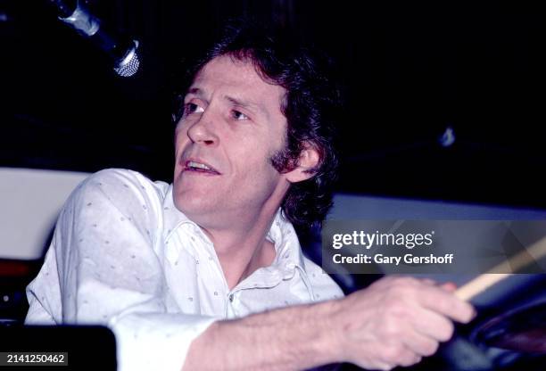 American Rock musician Levon Helm plays drums as he performs onstage at the Lone Star Cafe, New York, New York, February 17, 1981.