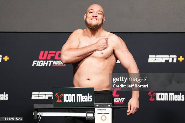 Valter Walker of Brazil poses on the scale during the UFC Fight Night weigh-in at UFC APEX on April 05, 2024 in Las Vegas, Nevada.