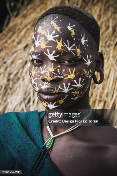 Young Surma Woman With Traditional Face Decoration, Southwest Ethiopia. Kibish, Ethiopia.