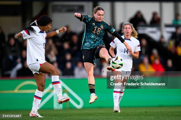 Sofie Zdebel of Germany is challenged by Elise Evans of USA at Sportclub Arena on April 05, 2024 in Verl, Germany.