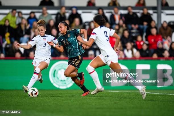 Lisa Baum of Germany is challenged by Savannah King of USA at Sportclub Arena on April 05, 2024 in Verl, Germany.