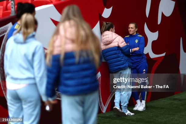 Niamh Charles of England and Magdalena Eriksson of Sweden talk prior to the UEFA EURO 2025 Women's Qualifiers match between England and Sweden at...