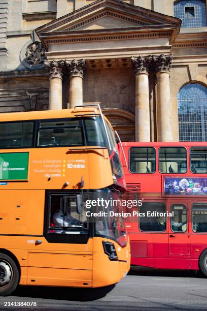 Double-decker buses on the go in Oxford, UK. Oxford, England.