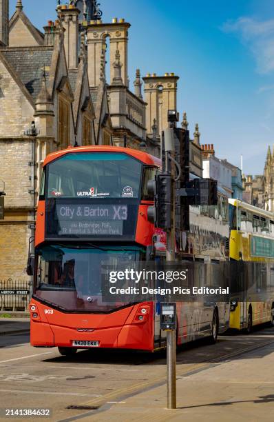Double-decker buses on the go in Oxford, UK. Oxford, England.