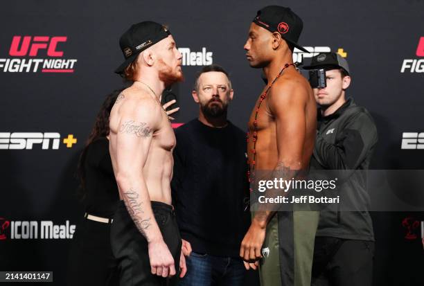 Opponents Dylan Budka and Cesar Almeida of Brazil face off during the UFC Fight Night weigh-in at UFC APEX on April 05, 2024 in Las Vegas, Nevada.