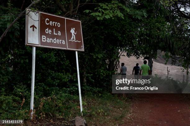 People walk towards Cerro de la Bandera on April 05, 2024 in Puerto Carreño, Colombia. Puerto Carreño is the departmental capital city, and a...