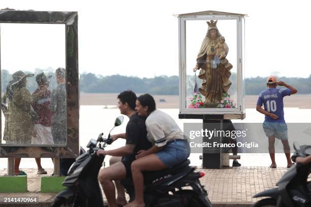 The statue of The Virgen Maria del Perto is seen at the port on the Orinoco River on April 05, 2024 in Puerto Carreño, Colombia. Puerto Carreño is...