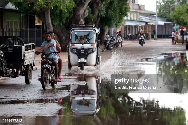 Man drives tuk Tuk at the port of the Orinoco River on April 05, 2024 in Puerto Carreño, Colombia. Puerto Carreño is the departmental capital city,...