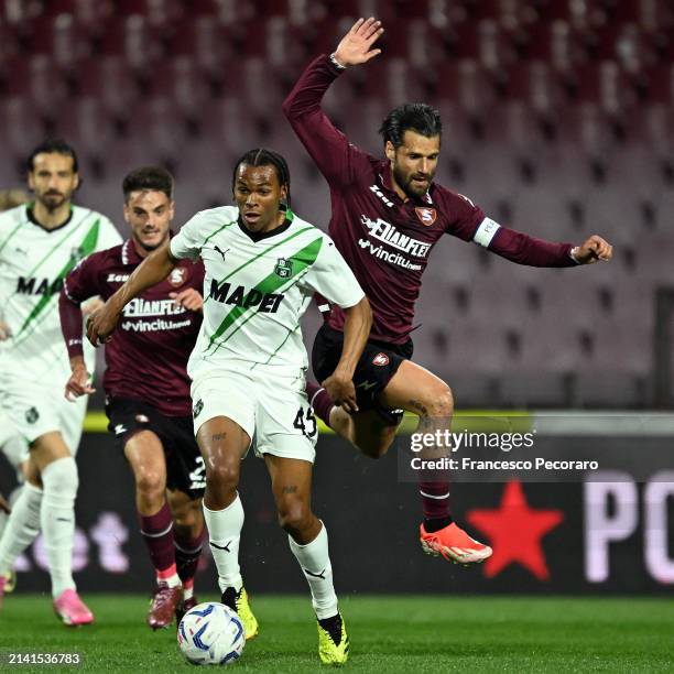 Armand Lauriente of US Sassuolo battles for possession with Antonio Candreva of US Salernitana during the Serie A TIM match between US Salernitana...