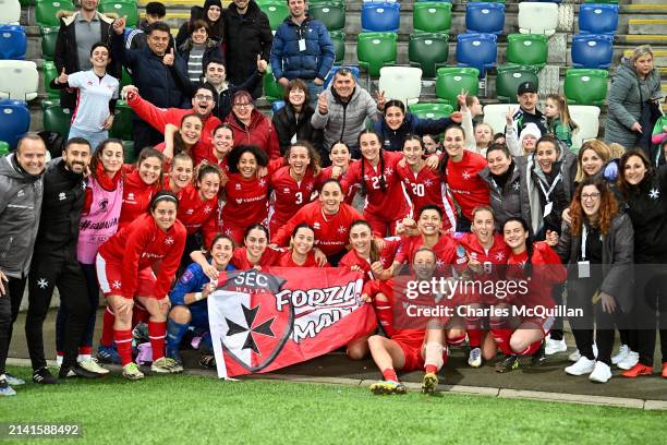 Players and staff of Malta celebrate following the team's draw in the UEFA EURO 2025 Women's Qualifiers match between Northern Ireland and Malta at...