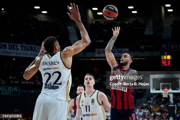 Edy Tavares of Real Madrid and Markus Howard of Baskonia Vitoria Gasteiz in action during the Turkish Airlines EuroLeague Regular Season Round 33...