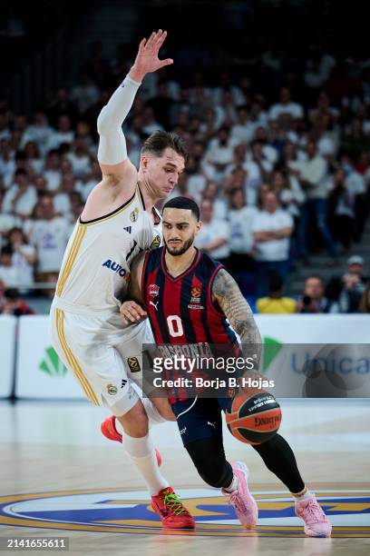 Mario Hezonja of Real Madrid and Markus Howard of Baskonia Vitoria Gasteiz in action during the Turkish Airlines EuroLeague Regular Season Round 33...