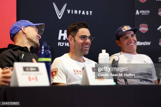 Patrick Lange of Germany, Joe Skipper of Great Britain and Braden Currie of New Zealand answer questions during a press conference prior to the 2024...