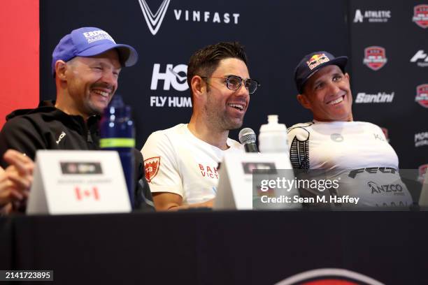 Patrick Lange of Germany, Joe Skipper of Great Britain and Braden Currie of New Zealand answer questions during a press conference prior to the 2024...