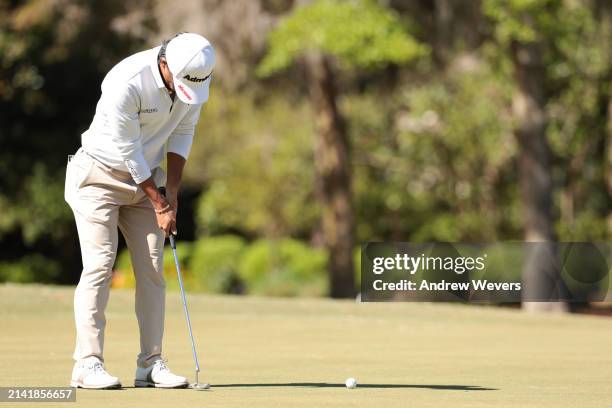 Satoshi Kodaira of Japan putts on the 11th green during the second round of the Club Car Championship at The Landings Golf & Athletic Club on April...