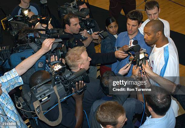 Vince Carter of the Toronto Raptors speaks to the media during a practice session for the Vince Carter Charity All Star Game in Toronto, Ontario....