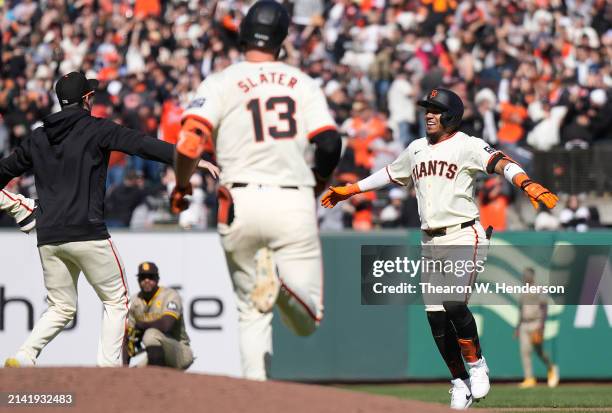 Thairo Estrada of the San Francisco Giants celebrates after he hit a walk-off rbi double scoring Matt Chapman with the winning run against the San...