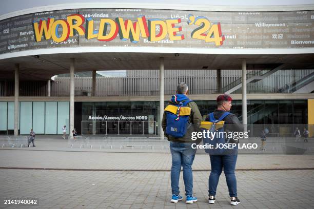 Two Italian attendees wait outside the venue of the McDonald's Worldwide Convention, held at the Fira Gran Via in Barcelona, on April 8, 2024. More...