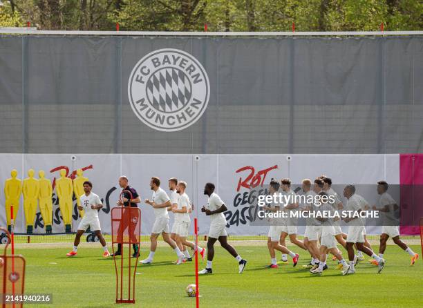 Bayern Munich's team attends a training session on April 8, 2024 in Munich, southern Germany, prior to the UEFA Champions League quarter-final first...