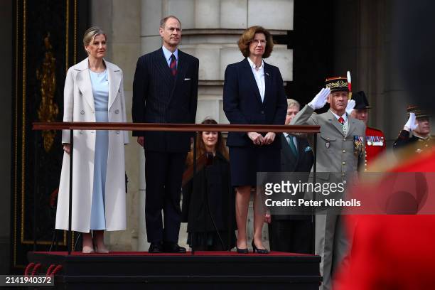 Sophie, Duchess of Edinburgh and Prince Edward, Duke of Edinburgh on behalf of King Charles III, stand with French Ambassador to the UK, Helene...