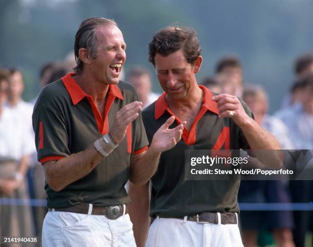 Prince Charles with his friend and team mate Geoffrey Kent after a polo match at Cirencester Polo Club on 21st May, 1989 in Cirencester, England.