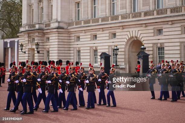 France's Gendarmerie's Garde Republicaine arrive at Buckingham Palace to take part in the Changing of the Guard to commemorate the 120th anniversary...