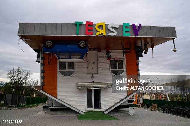 45 Upside Down House Illusion Stock Photos, High-Res Pictures, and