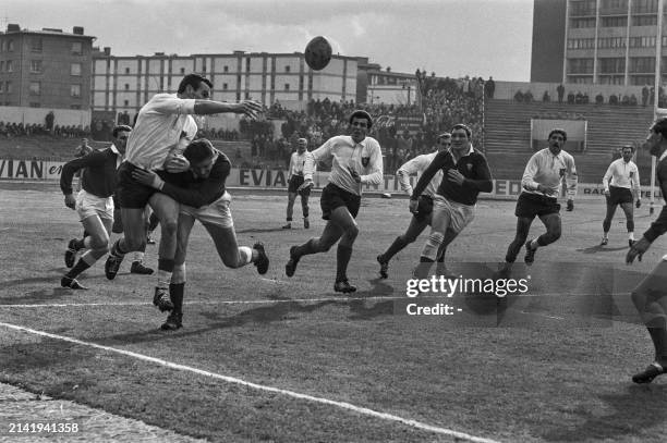 French rugby player Pierre Albaladejo passes the ball during the final of the Five Nations Championship in the stadium of Colombes, on March 23...